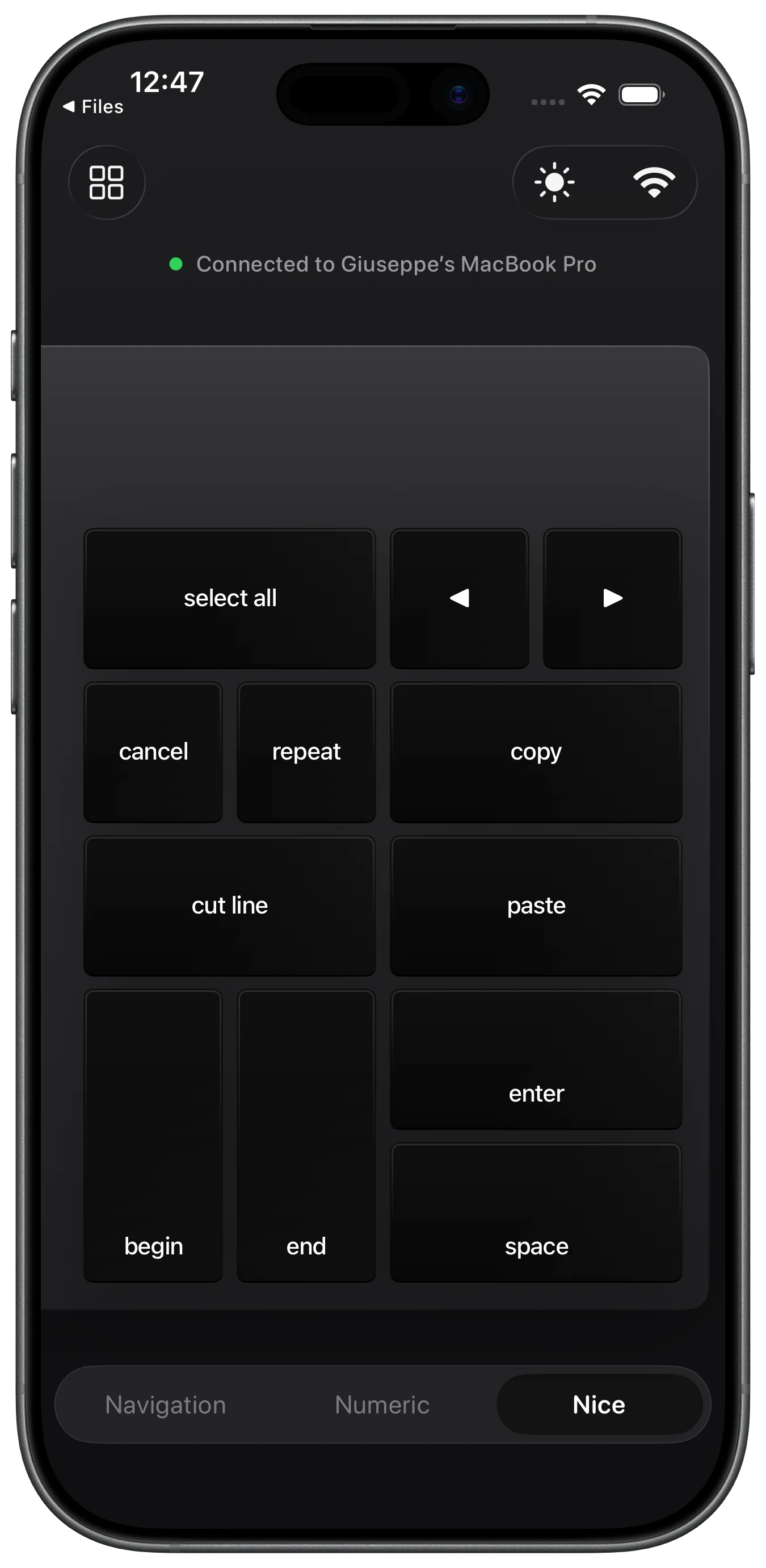 Padme app showing a custom navigation keypad with arrow keys, connected to a MacBook over Wi-Fi